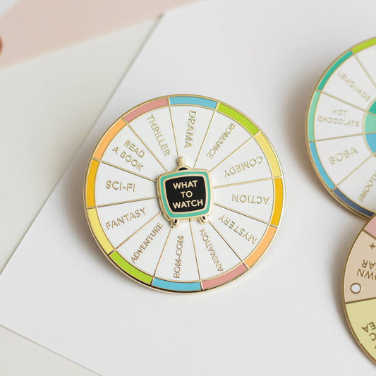 Occasionalish - What To Watch Spinning Enamel Pin